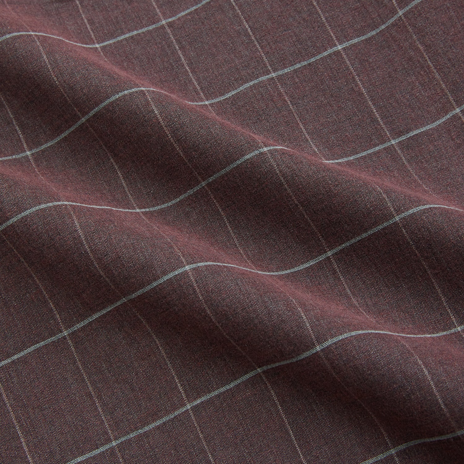 View 6 of product The Turnbull & Asser Burgundy Check Hampstead Overshirt, featuring a button-up front, collar, white windowpane pattern, and two front pockets, is laid flat on a white background—perfect for elegant formal wear.
