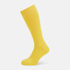 View 1 of product A single Charteuese Lemon Mid-Length Sock by Turnbull & Asser, knee-high and bright yellow with a ribbed Egyptian cotton texture, is displayed upright against a plain white background.