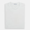 View 5 of product Experience comfort in the Turnbull & Asser White Short-sleeve Pyjama Shirt—a plain crew neck T-shirt laid flat on a white background, perfect as elevated loungewear or a sleek pyjama essential.