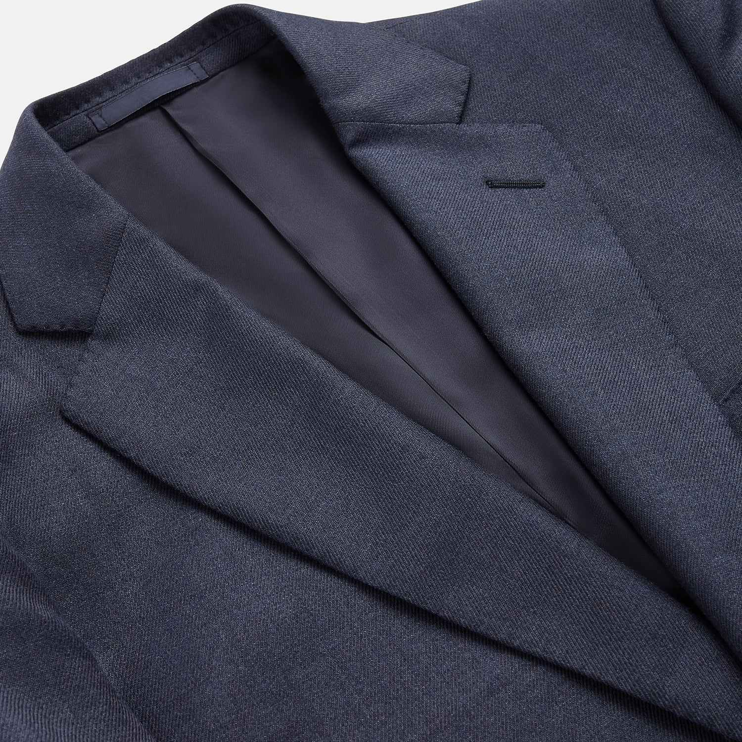 View 2 of product The Turnbull & Asser Navy Wool Blend Barrington Blazer features a notched lapel, single-button closure, three front pockets, and sleeve button accents, shown against a plain white background.