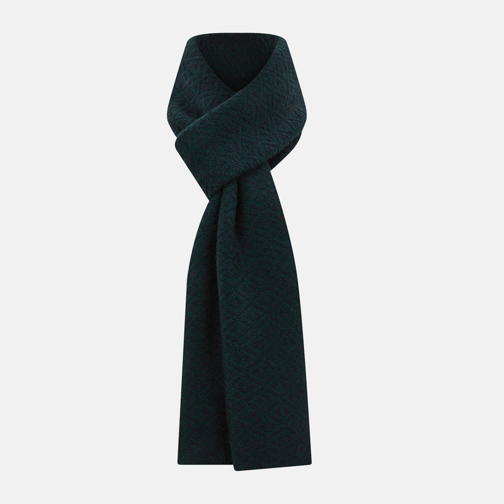 The Turnbull & Asser Navy Blue and Forest Green Diamond-Patterned Cashmere Knitted Scarf features a subtle textured design, shown loosely draped with ends hanging down—an essential, stylish addition to any cool-weather wardrobe.