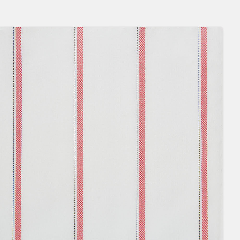 The Turnbull & Asser Coral Track Stripe Hand-Rolled Handkerchief features evenly spaced vertical coral stripes bordered by thin gray lines, finished with hand-rolled edges and displayed neatly folded on a white background.