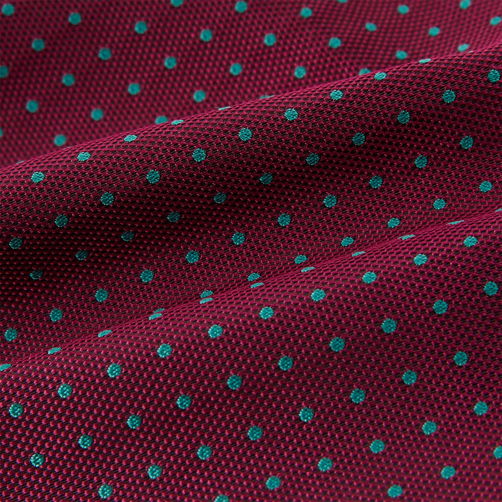 The Turnbull & Asser Blue and Burgundy Micro Dot Silk Cravat features a subtle pattern, making it a refined formal accessory that adds elegance to your outfit.