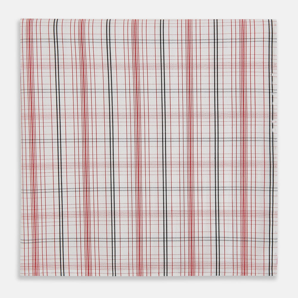 A close-up of the Red Multi Check Hand-Rolled Handkerchief by Turnbull & Asser, showcasing its classic check pattern and expert English craftsmanship.
