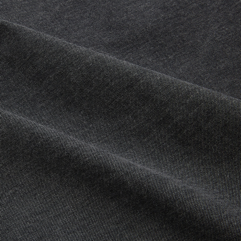 The Charcoal Melange Hampstead overshirt by Turnbull & Asser is a dark gray long-sleeve button-up with a collar, left chest pocket, and two zippered side pockets, shown laid flat on a white background.