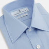 View 2 of product The Turnbull & Asser Blue Cotton Shirt features a T&A collar, 3-button cuffs, and white buttons—ideal for navy suits or smart looks. Laid flat on a white background.