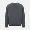 View 3 of product The Turnbull & Asser Grey Melange Cashmere Cardigan features a V-neck, ribbed cuffs and hem, front buttons, and two pockets—an elegant piece from our timeless knitwear collection. Shown here against a plain white background.