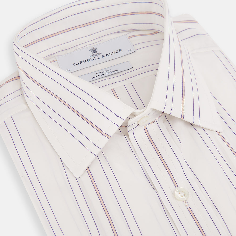 The Purple and Rose Multi Stripe Mayfair Shirt by Turnbull & Asser features thin blue, red, and gray stripes on white, a classic collar, and long sleeves. This British design is displayed on a plain white surface.