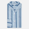 View 5 of product The Blue Baiadera Stripe Pyjama Shirt by Turnbull & Asser features long sleeves, a chest pocket, and a notched collar for an elegant nightwear look, shown on a white background.