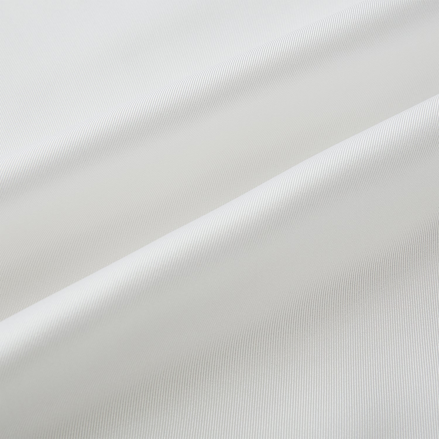 Image 3 of product The Turnbull & Asser White Silk Scarf features fringed edges and discreet black branding in the corner, making it a refined accessory for tuxedo jackets or formal wear. Presented neatly folded on a plain white background.