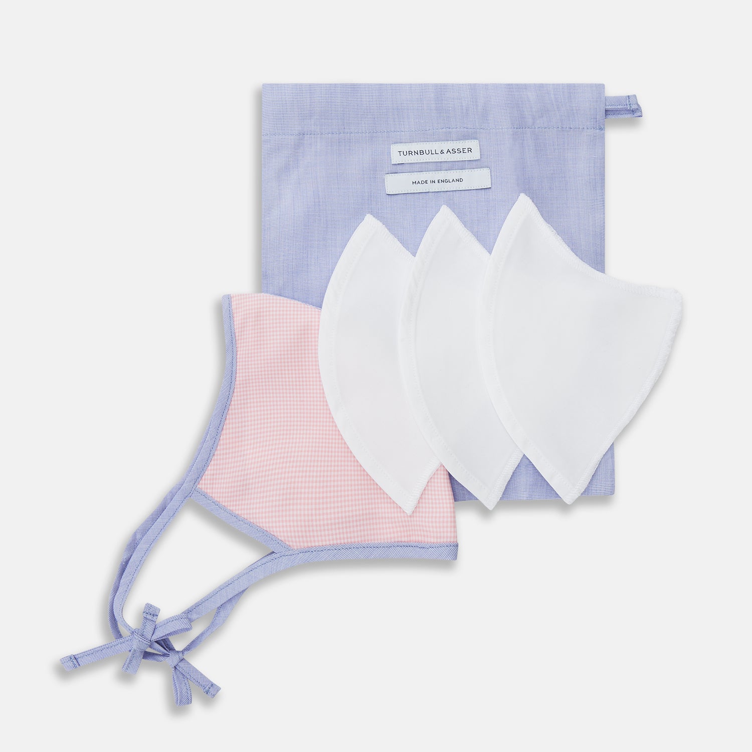 View 6 of product The Turnbull & Asser Pink & Blue Check Commuter Mask features lavender adjustable ear loops tied in bows and comes with 3 Viroformula™ filters. Shown on a plain white background.