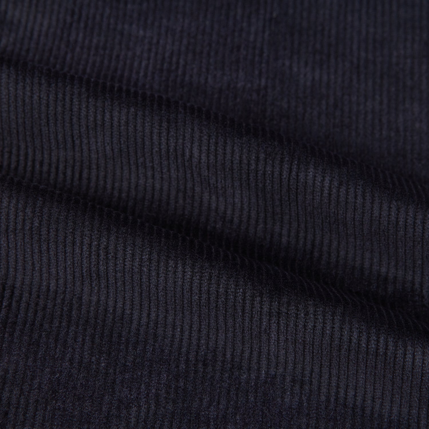 View 6 of product The Turnbull & Asser Navy Corduroy Henry Trousers are tailored fit with a straight-leg cut, made from a wool-cotton blend, and feature front button and zip closure, shown against a plain white background.