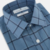 View 2 of product The Turnbull & Asser Steel Grey Grid Check Mayfair Shirt is a long-sleeve, button-up shirt in light blue Italian cotton, shown against a plain white background.
