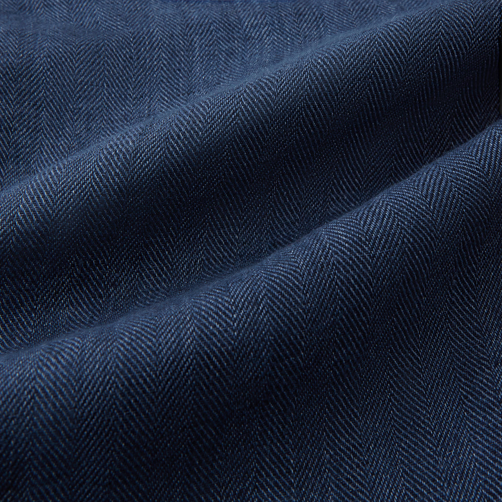 Turnbull & Asser Denim Blue Linen Herringbone Miles Trousers with a straight-leg fit, elasticated waist, and drawstring tie, shown against a plain white background.