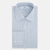 View 5 of product The Turnbull & Asser Navy and Blue Multi Check Mayfair Shirt features a T&A collar, button cuffs, and a blue checkered pattern. This long-sleeve, button-up shirt is shown on a white background.