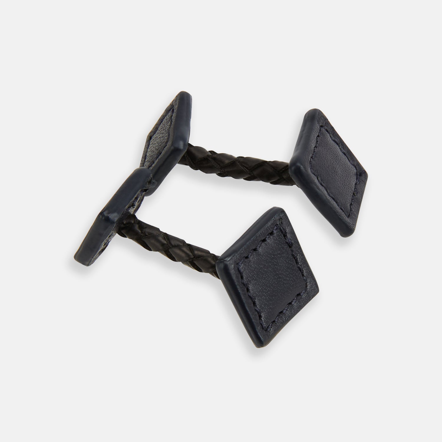 View 1 of product Navy Leather Cufflinks by Turnbull & Asser—Italian leather with square ends and braided stems, shown on a white background—a refined addition to men's accessories.