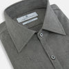 View 2 of product The Pale Charcoal Westminster Shirt by Turnbull & Asser features British craftsmanship with a tailored silhouette, long sleeves, pointed collar, buttoned cuffs, and a solid pale charcoal hue, elegantly shown against a white background.