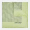 View 1 of product The Melon Green Stripe Silk Pocket Square by Turnbull & Asser features thin vertical black lines on light green silk, neatly folded to display both sides. The lower corner reads “TURNBULL & ASSER HAND PRINTED IN ENGLAND.”.