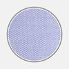View 1 of product Close-up of a circular swatch of Turnbull & Asser’s Blue Herringbone Cotton Fabric, featuring a light blue diagonal zigzag pattern bordered in gray on a white background.