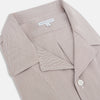 View 2 of product The Turnbull & Asser Brown Micro Check Quarzo Nightshirt is a long-sleeve shirt dress inspired by classic sleepwear, featuring a collar, chest pocket, upper front buttons, and a subtle micro check pattern on a white background.