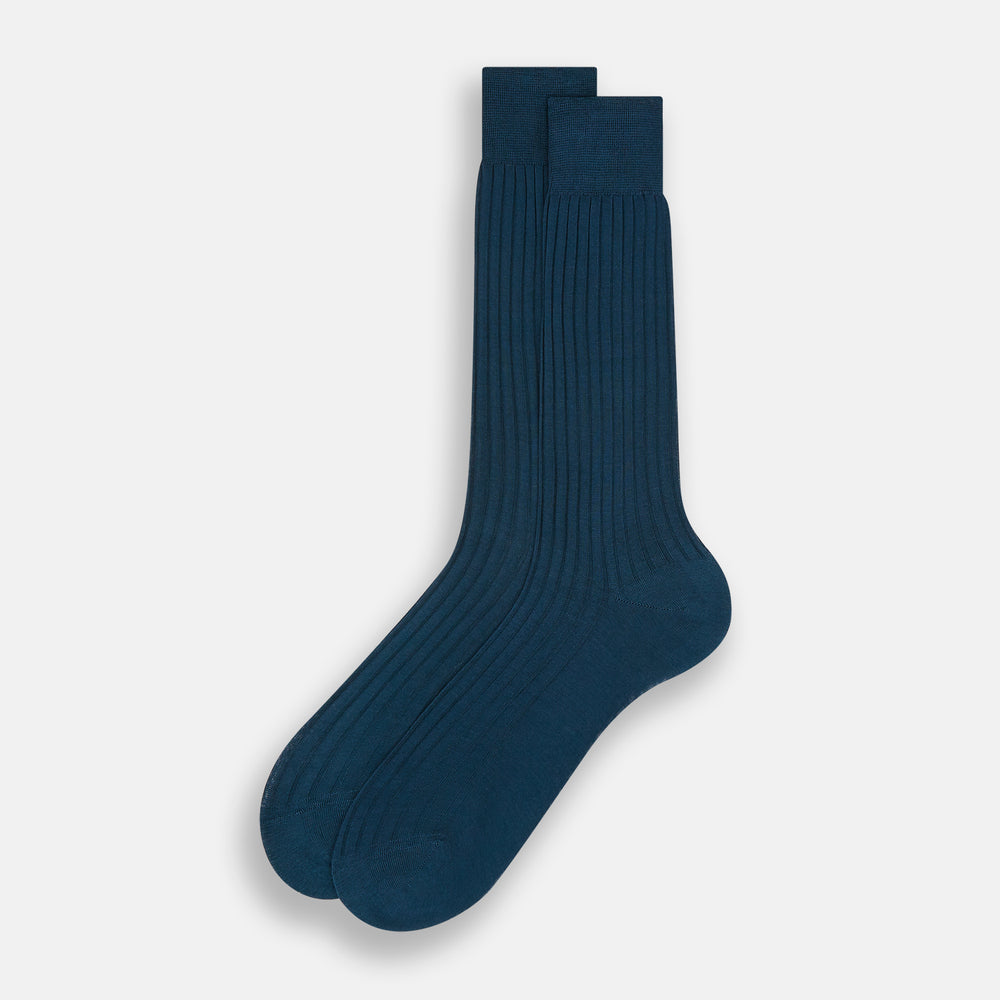 A single Turnbull & Asser Petrol Mid-Length Sock, made from mercerised Egyptian cotton, is displayed at an angle on a white background, showcasing its ribbed texture and premium comfort.