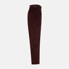 View 4 of product The Turnbull & Asser Burgundy Corduroy Henry Trousers feature a straight-leg cut, button and zip closure, and adjustable side tabs—perfect for refined formalwear—shown here on a plain white background.