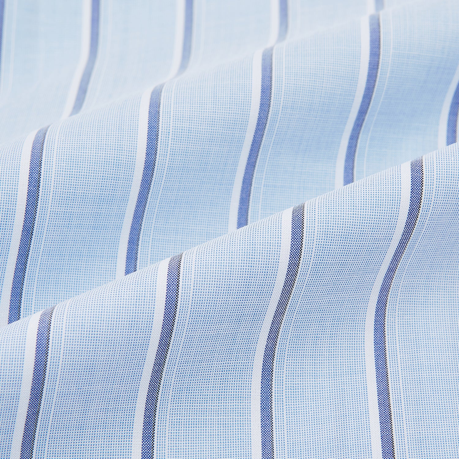 View 8 of product The Blue and Navy Multi-Stripe Westminster Shirt by Turnbull & Asser, featuring bold vertical stripes and a classic collar, exemplifies British craftsmanship and is shown laid flat on a white background.