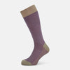 View 1 of product The Turnbull & Asser Concrete Houndstooth Mid-Length Sock features a purple and black houndstooth pattern with beige cuff, heel, and toe, crafted from soft cotton and shown on a plain white background.