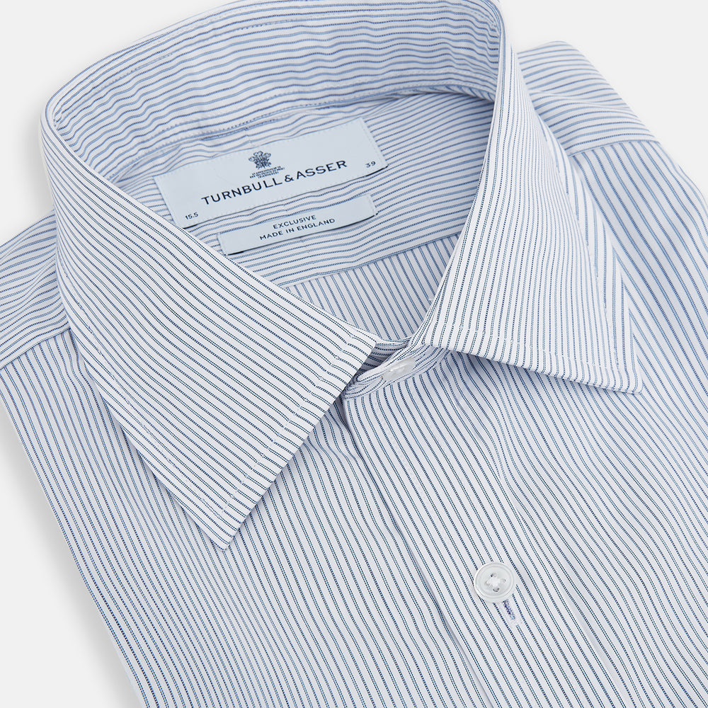 The Blue Ticking Pinstripe Mayfair Shirt by Turnbull & Asser features long sleeves, a button-down front, and classic T&A collar, shown on a plain white background.