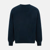 View 3 of product The Turnbull & Asser Dark Green Melange Cashmere V-neck Jumper features long sleeves, ribbed cuffs and hem—an essential piece of classic knitwear displayed on a white background.