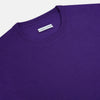 View 2 of product The Turnbull & Asser Purple Merino Round Neck Jumper, a classic men’s knitwear piece, is shown against a white background.