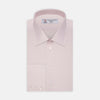 View 2 of product A close-up of Turnbull & Asser's Pink Cotton Fabric shows its fine, smooth texture and subtle stitching inside a circular gray-bordered frame against a white background.