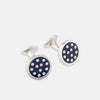 View 1 of product The Turnbull & Asser Navy Spotted Circle Enamel Cufflinks feature round faces with silver polka dots, offering a classic men's accessory in a striking navy design.