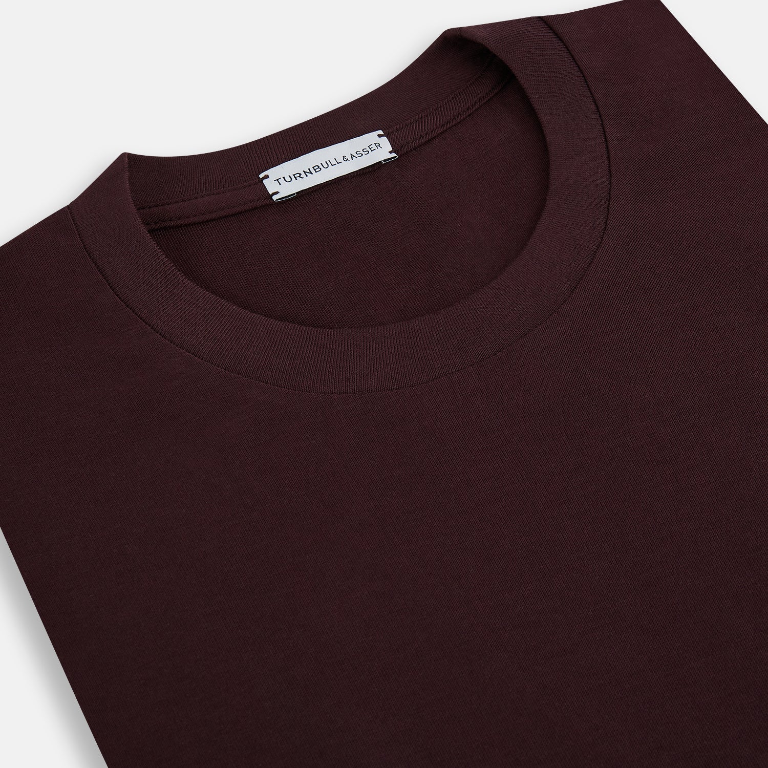 View 2 of product The Turnbull & Asser Burgundy Short-Sleeve T-shirt, featuring a crew neckline and clean design with no visible logos, is shown against a white background for a timeless and versatile look.