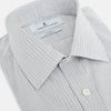 View 2 of product A tailored-fit Turnbull & Asser Mayfair Shirt in midnight blue with a grid check pattern, spread collar, and buttoned cuffs, crafted from premium Italian cotton and laid flat on a white background.