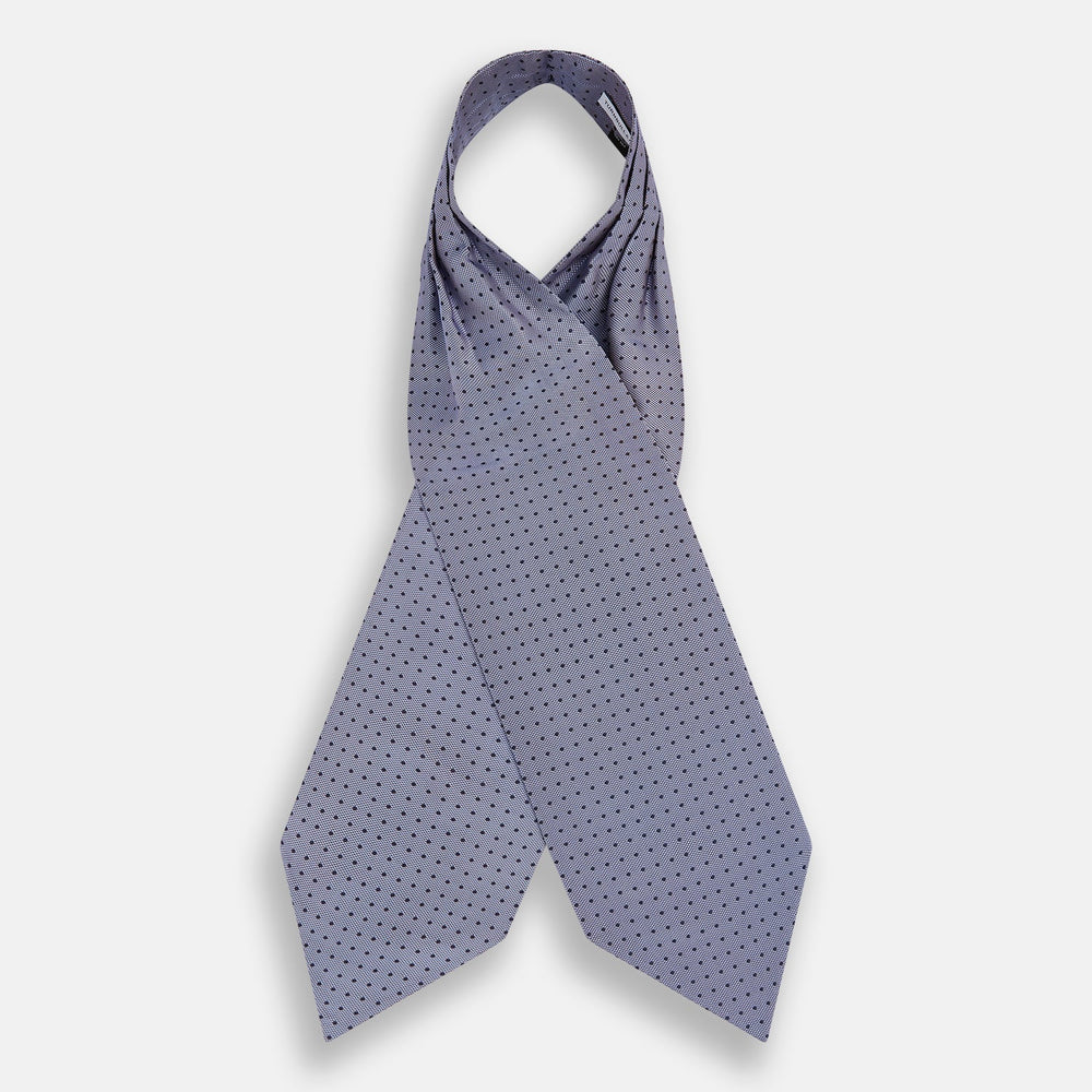A light gray pocket square with small black polka dots pairs perfectly with the Turnbull & Asser Navy and Light Blue Micro Dot Silk Cravat for a refined, polished formal look.