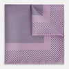 View 1 of product The Lilac Dot Silk Pocket Square by Turnbull & Asser is handmade from silk in a folded design, featuring small black polka dots and a solid border.