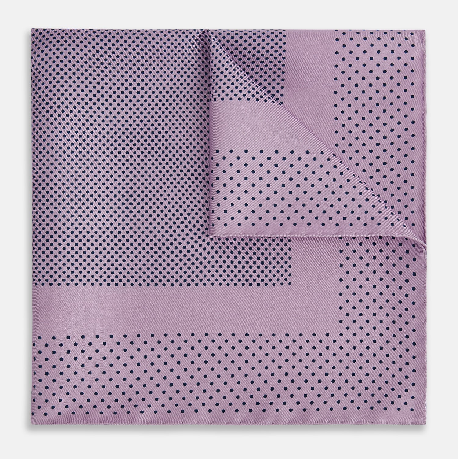 View 1 of product The Lilac Dot Silk Pocket Square by Turnbull & Asser is handmade from silk in a folded design, featuring small black polka dots and a solid border.