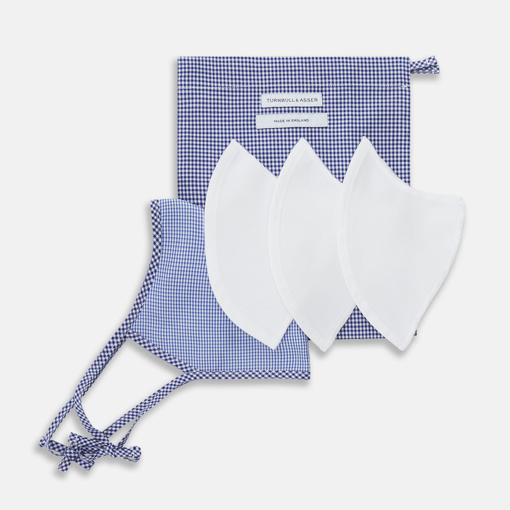 The Turnbull & Asser White & Navy Multi Check Commuter Mask comes with 3 Viroformula™ filters and two adjustable tie straps on each side, shown on a plain white background.