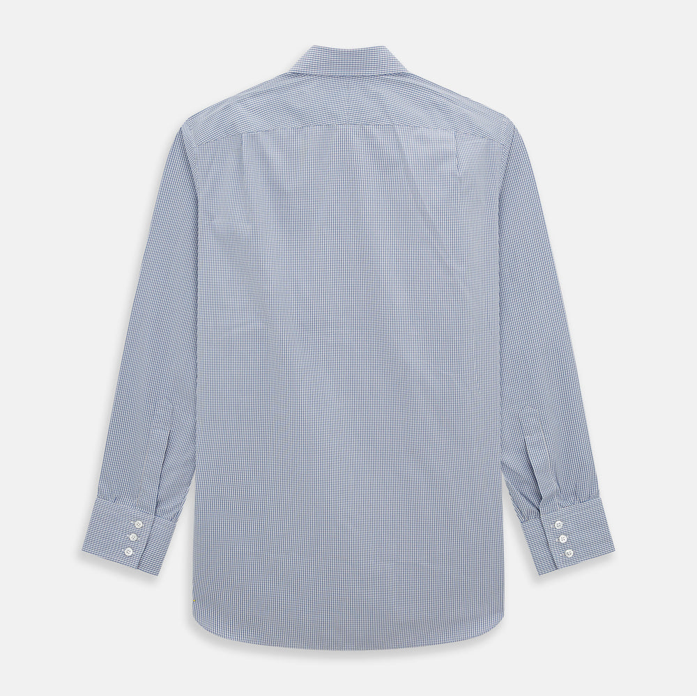 The Turnbull & Asser Pale Blue Micro Graph Check Mayfair Shirt features a small blue and white check pattern, classic T&A collar, white buttons, and buttoned cuffs. Presented on a plain white background.
