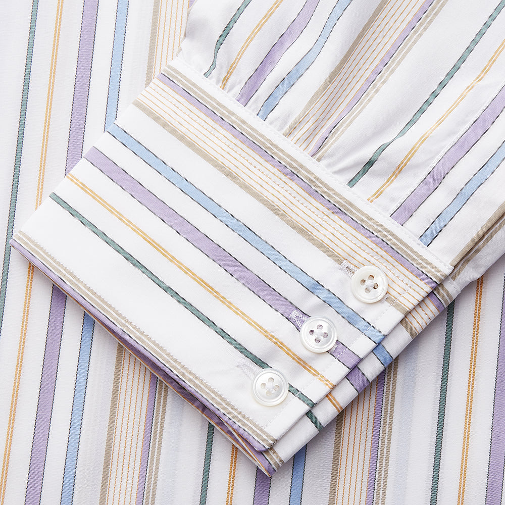 The Colourful Garden Multi Stripe Cotton Regular Fit Mayfair Shirt by Turnbull & Asser features a collar, buttoned cuffs, and vertical stripes in blue, yellow, pink, and white on a light background for a relaxed look.