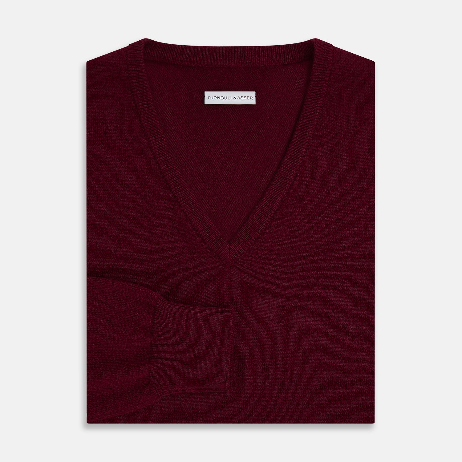 View 7 of product The Turnbull & Asser Burgundy Cashmere V-neck Jumper is shown on a white background.