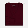 View 4 of product The Turnbull & Asser Burgundy Cashmere V-neck Jumper is shown on a white background.