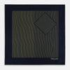 View 3 of product The Turnbull & Asser Navy and Gold Stripe Silk Pocket Square features light yellow vertical stripes, a folded corner, and "TURNBULL & ASSER HAND PRINTED IN ENGLAND" in gold at the bottom right.