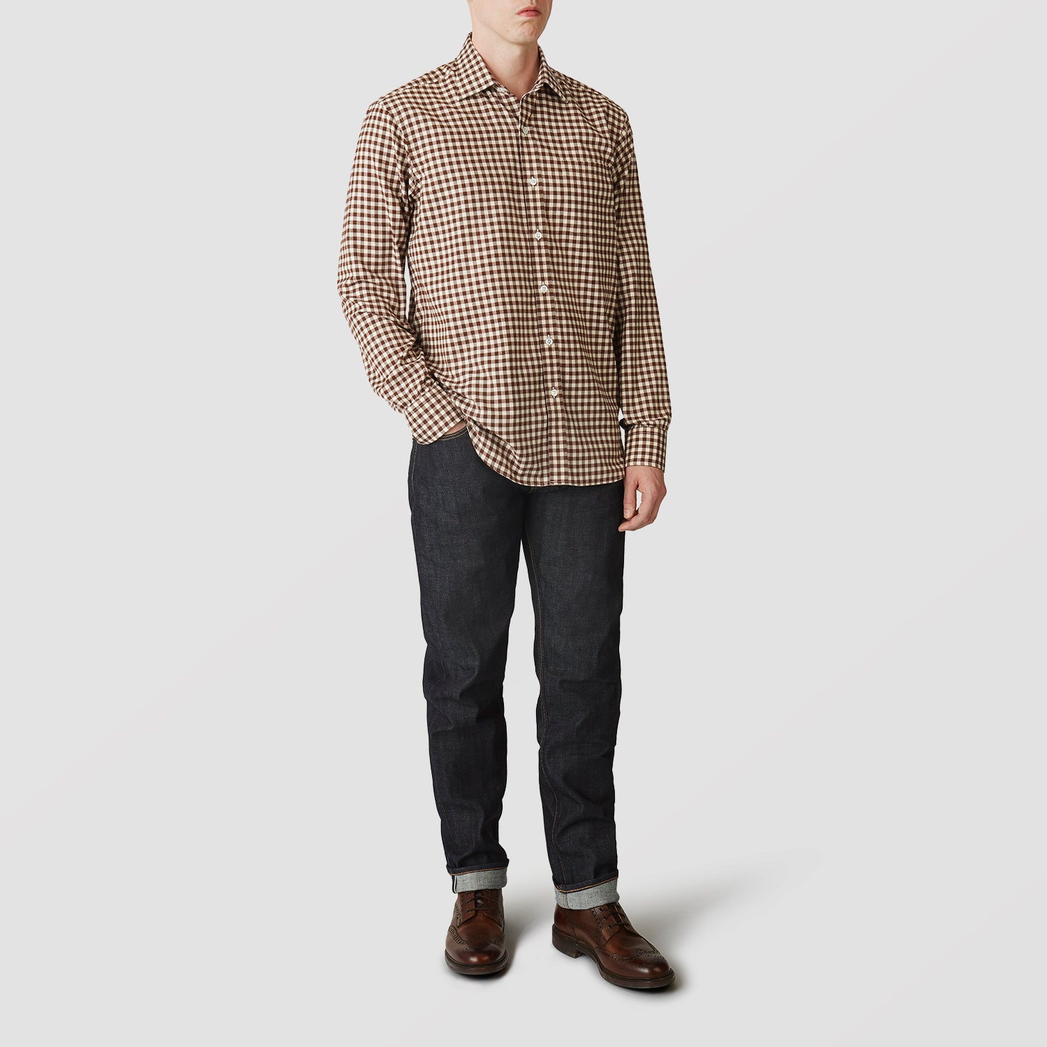 View 2 of product The Turnbull & Asser Brown Check Weekend Fit Shirt features a Derby collar, 1-button cuffs, and a brown check pattern—ideal for winter layering. Shown against a plain white background.