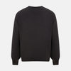 View 3 of product The Turnbull & Asser Charcoal Grey Merino V Neck Jumper is a classic long-sleeve knit with ribbed cuffs and hem, featured in our knitwear collection and shown against a white background.
