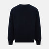 View 3 of product The Navy V-Neck Cashmere Cardigan by Turnbull & Asser features a button-up front, ribbed cuffs and hem, and two front pockets—a classic from our knitwear collection.