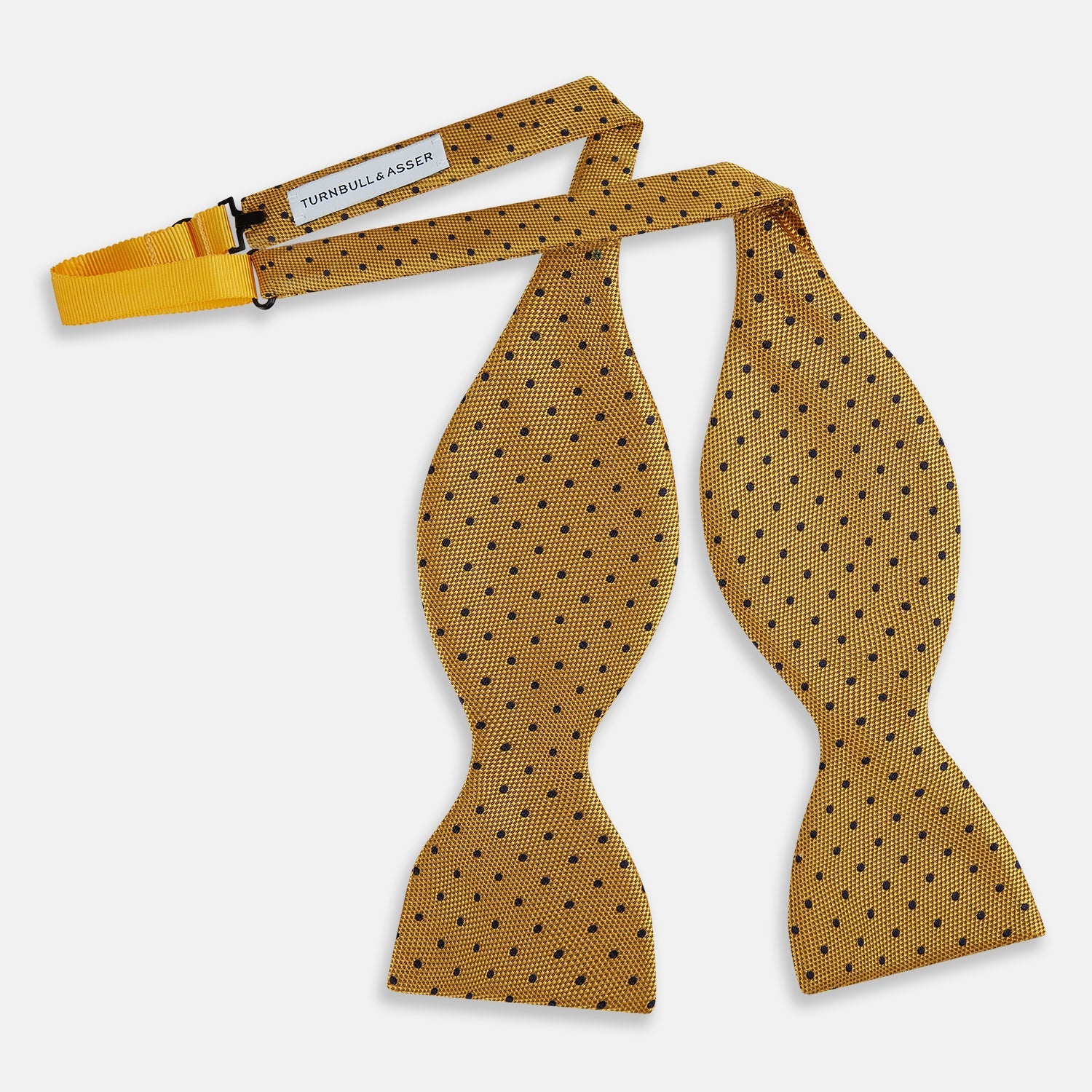 View 2 of product The Navy and Yellow Micro Dot Silk Bow Tie by Turnbull & Asser features a refined dot pattern—an ideal accessory for elevating sophisticated outfits.