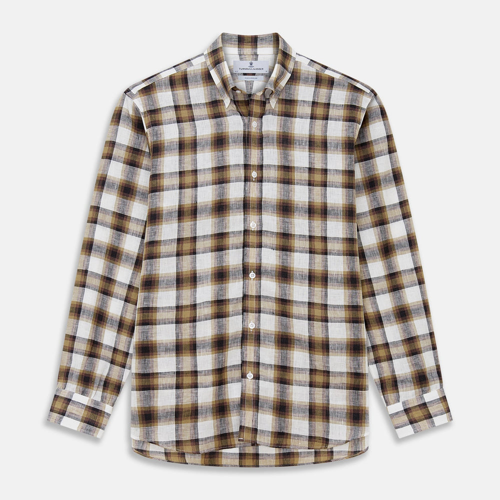 Close-up of Turnbull & Asser’s Brown Multi Check Linen Fabric, featuring a pattern of black, brown, and white intersecting lines within a circular frame on a light gray background. The linen surface is slightly wrinkled.