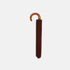 View 2 of product A fully opened Turnbull & Asser Burgundy Telescopic Umbrella with a brown maple crook handle, displayed against a plain white background—a refined men's accessory.